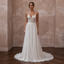 Beach Destination Bridal Gown with Spaghetti Straps and Flowing Skirt