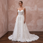 Chapel train lace wedding dress featuring an A-line silhouette and intricate floral embroidery. Perfect for a bride.