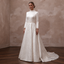 Ivory satin high-neck wedding dress with long sleeves and embroidered A-line skirt