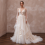 Feminine Tulle Bridal Gown with Floral Appliques