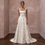 Ivory floral brocade A-line dress with square neck, perfect for autumn weddings and special occasions.