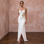Minimalist ivory matte jersey sheath dress with cowl back and gold embroidered detail, featuring a front slit.