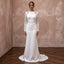 White satin sheath wedding dress with long sleeves and lace cutout bodice