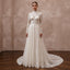 Ivory high-neck lace wedding dress with long sleeves and full tulle skirt, corset bodice