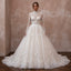 Vintage lace high-neck wedding dress with long sleeves and full ball gown skirt