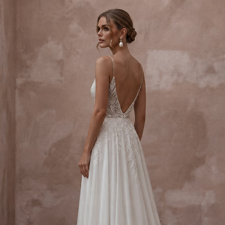 Beach Destination Bridal Gown with Spaghetti Straps and Flowing Skirt - Apparel & Accessories > Clothing > Wedding & Bridal Party Dresses > Wedding Dresses - Mignonette Bridal
