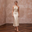 Champagne silk satin halter neck midi slip dress with intricate beaded detailing, perfect for wedding guests.