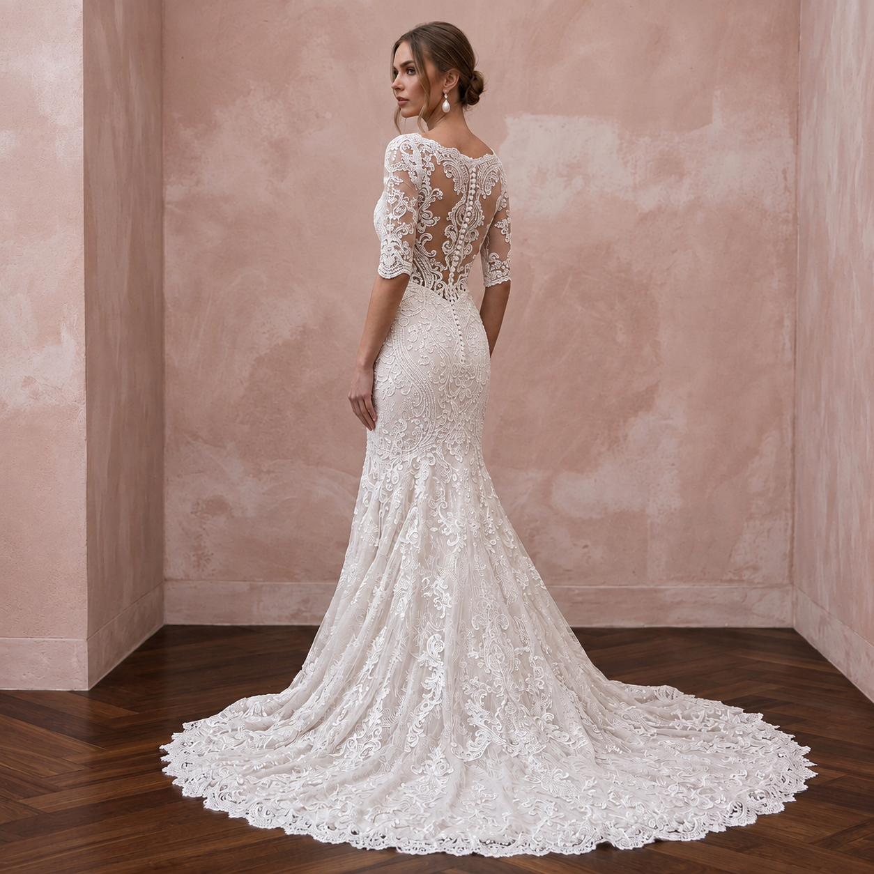 Elegant mermaid lace bridal dress with chapel train and sheer back, perfect for a church wedding.