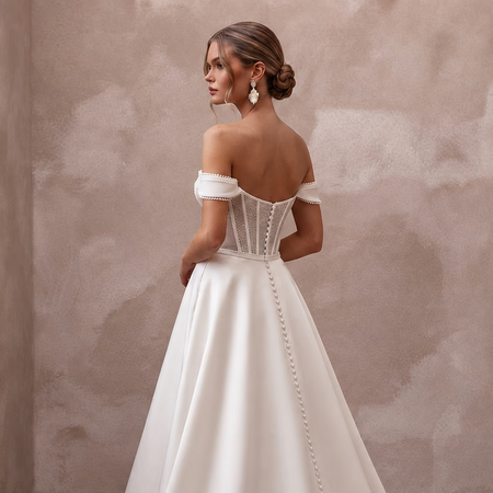 Satin wedding gown with corset bodice, off-shoulder lace straps, open back