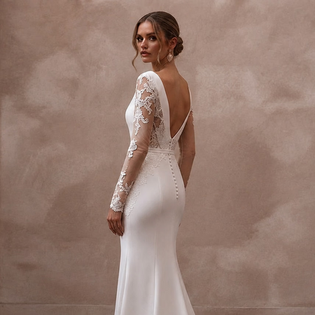 White satin mermaid wedding dress with long lace sleeves and V-back