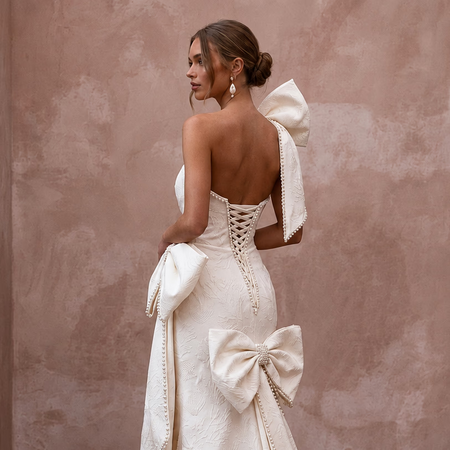 Contemporary Wedding Dresses with Oversized Bow Details - Apparel & Accessories > Clothing > Wedding & Bridal Party Dresses > Wedding Dresses - Mignonette Bridal