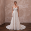 Elegant lace wedding gown with a court train, featuring a fitted bodice and delicate straps, perfect for a civil ceremony.