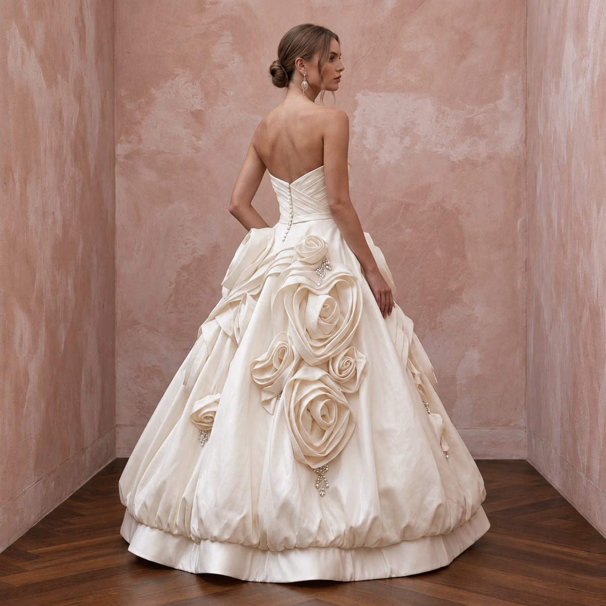 Elegant cream satin strapless wedding gown featuring a bubble skirt and floral organza details. Perfect for bridal style.