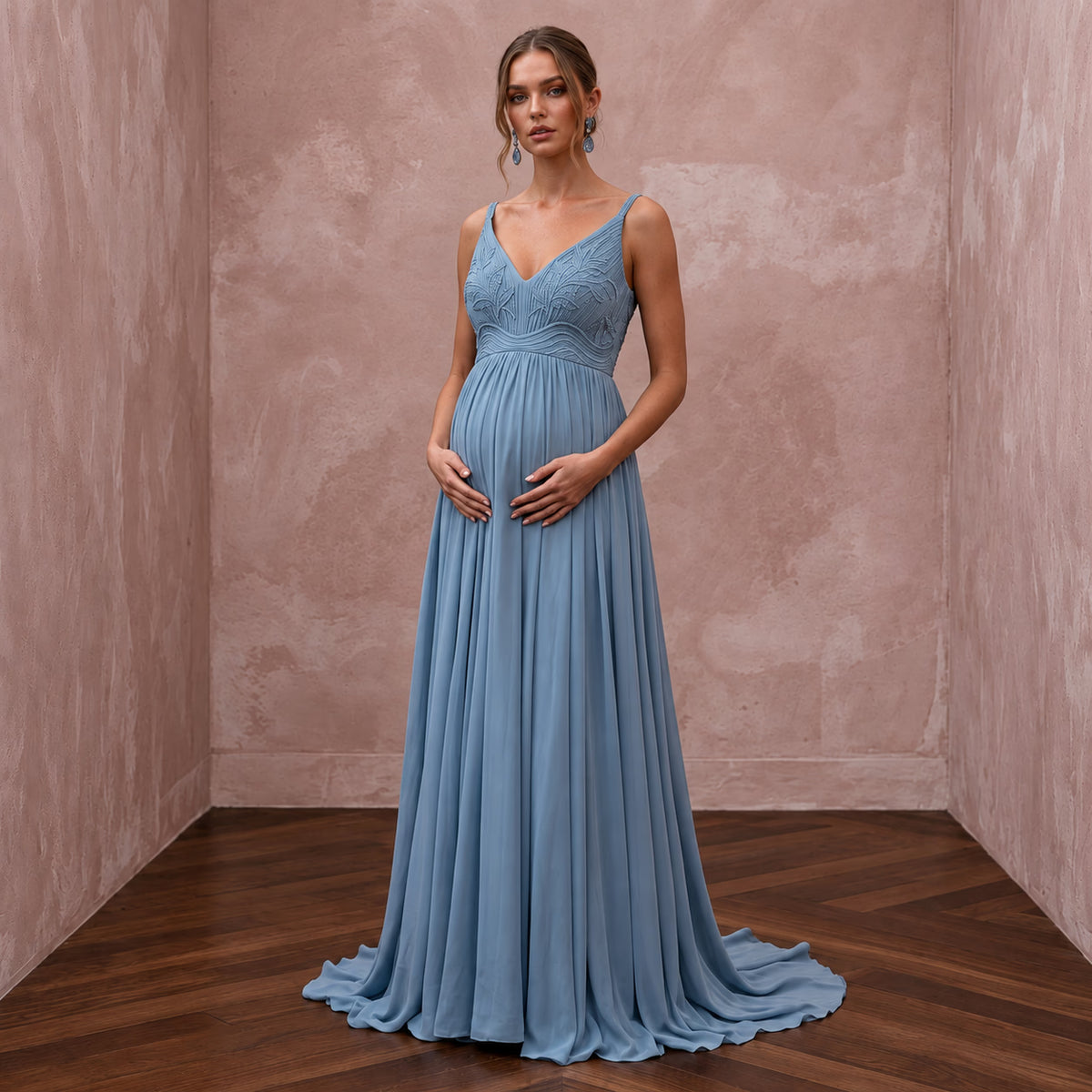 Dusty blue flowing georgette maternity dress with empire waist, perfect for formal occasions.