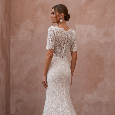 White lace wedding dress with sheer illusion back, short sleeves, mermaid silhouette