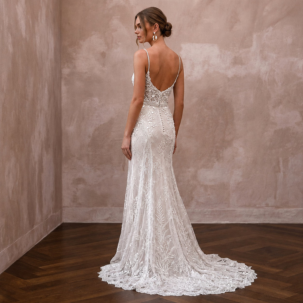 Elegant Lace Wedding Dress with Spaghetti Straps for a Beach Wedding