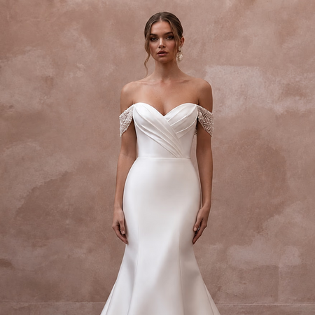 White satin off-the-shoulder wedding dress with sweetheart bodice and draped seams