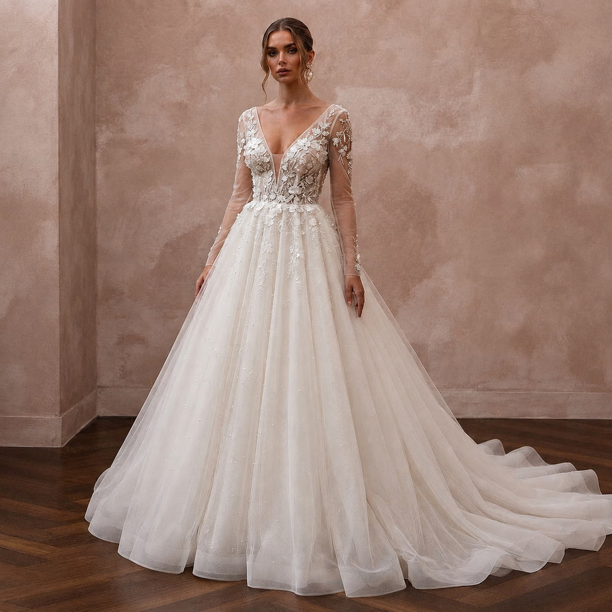 Ivory tulle ball gown wedding dress with lace bodice, deep V-neck and long sleeves Main image