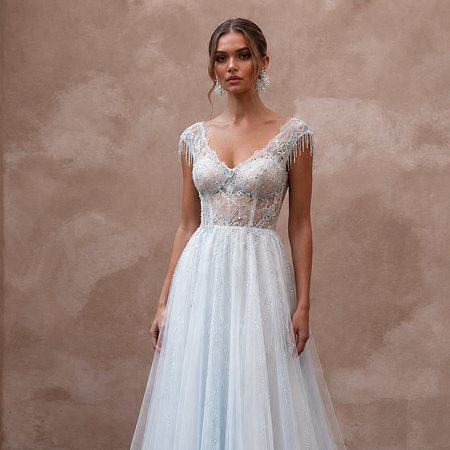 Ethereal Blue-Tinged White Tulle Gown for Ice Hotel Reception