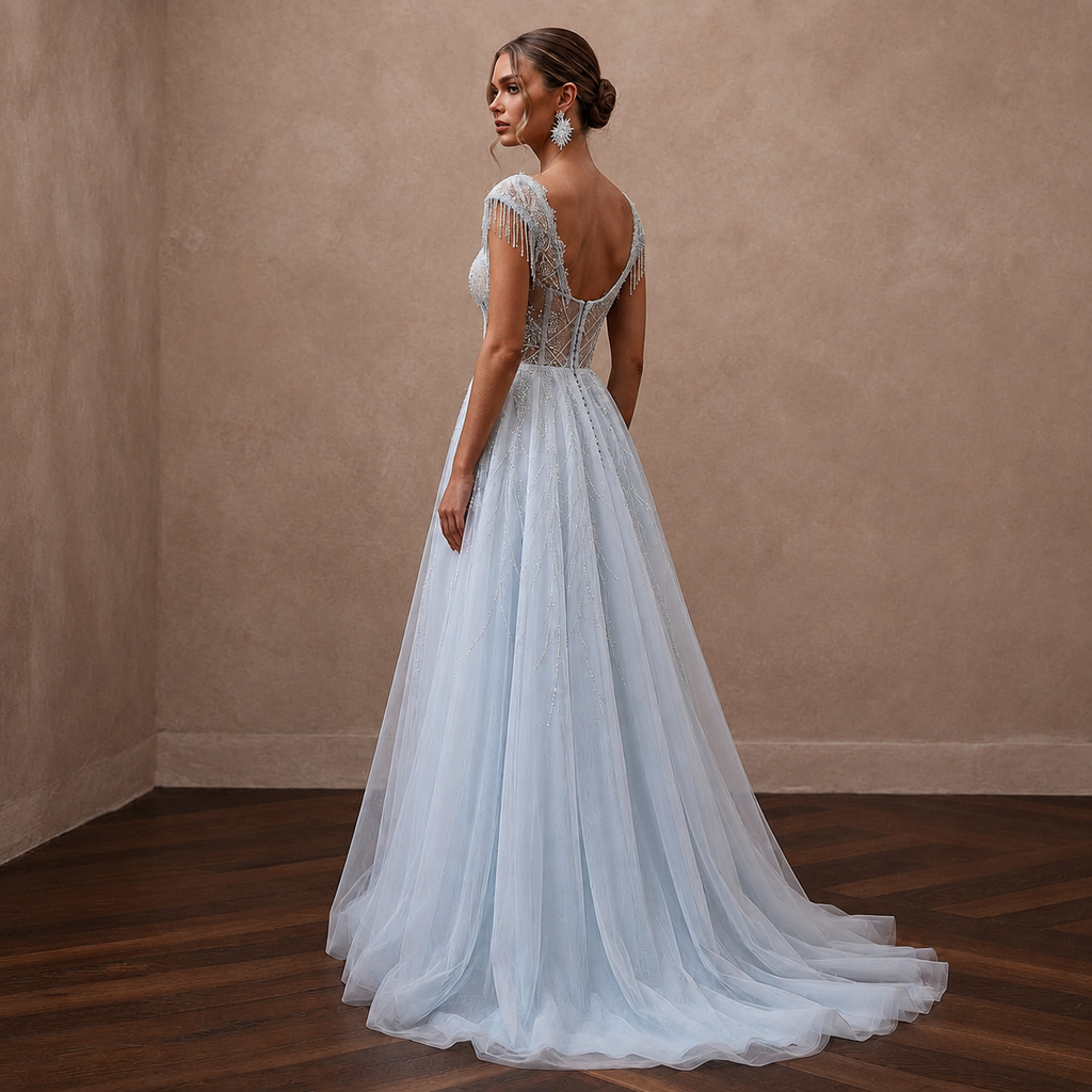 Ethereal Blue-Tinged White Tulle Gown for Ice Hotel Reception