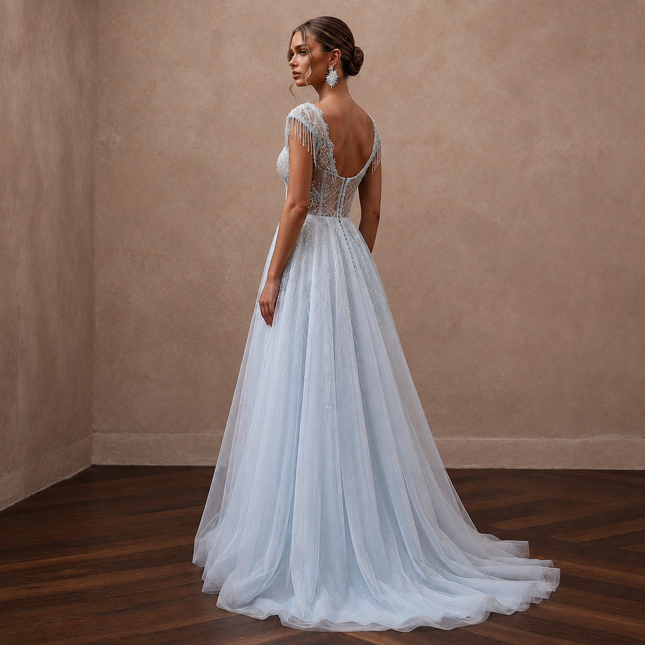 Ethereal Blue-Tinged White Tulle Gown for Ice Hotel Reception