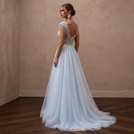 Ethereal Blue-Tinged White Tulle Gown for Ice Hotel Reception