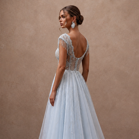 Ethereal Blue-Tinged White Tulle Gown for Ice Hotel Reception