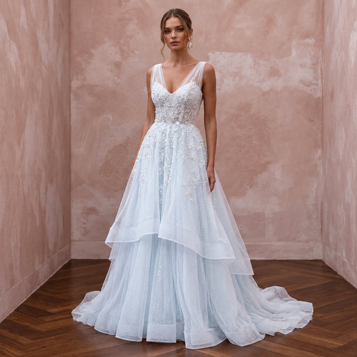 Ethereal Blue-Tinged White Tulle Wedding Gown for Ice Hotel Reception