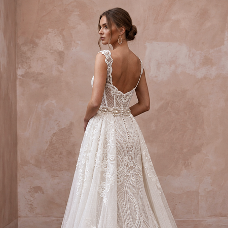 Fashion-Forward Lace Bridal Gown with Overskirt