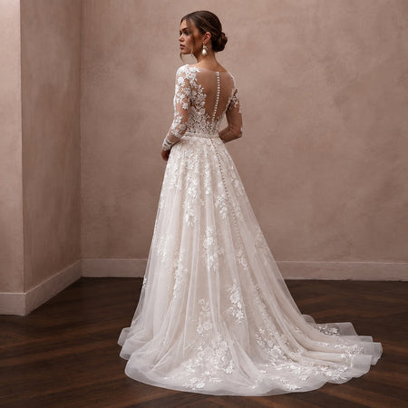Floral Lace Wedding Dress with Illusion Sleeves for a Romantic Ceremony