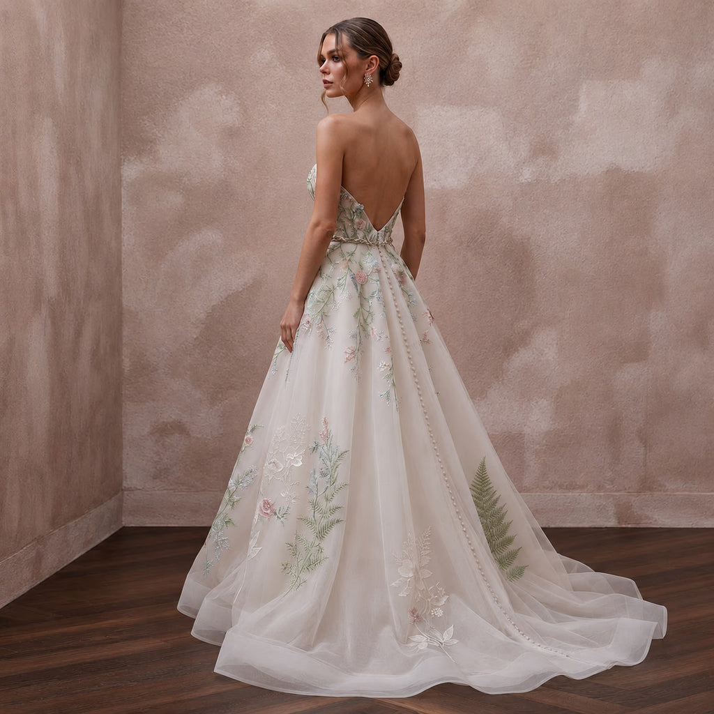 Garden-Inspired Wedding Gown with Embroidered Bodice and Flowing Skirt