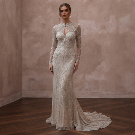 Long Sleeve Beaded Bridal Gown for a New Year's Wedding