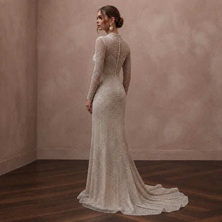 Long Sleeve Beaded Bridal Gown for a New Year's Wedding