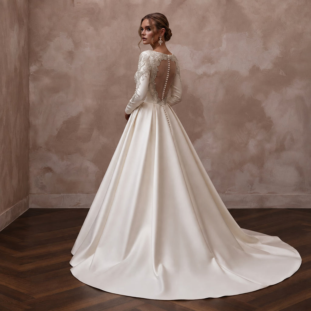 Long Sleeve Satin Bridal Dress for a Formal Cathedral Wedding