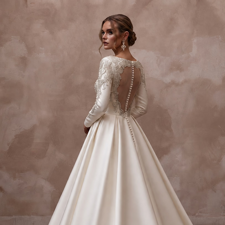 Long Sleeve Satin Bridal Dress for a Formal Cathedral Wedding