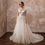 Long Sleeve Tulle Bridal Gown for a Black-Tie Wedding