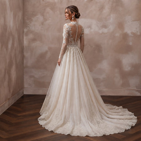Long Sleeve Tulle Bridal Gown for a Black-Tie Wedding
