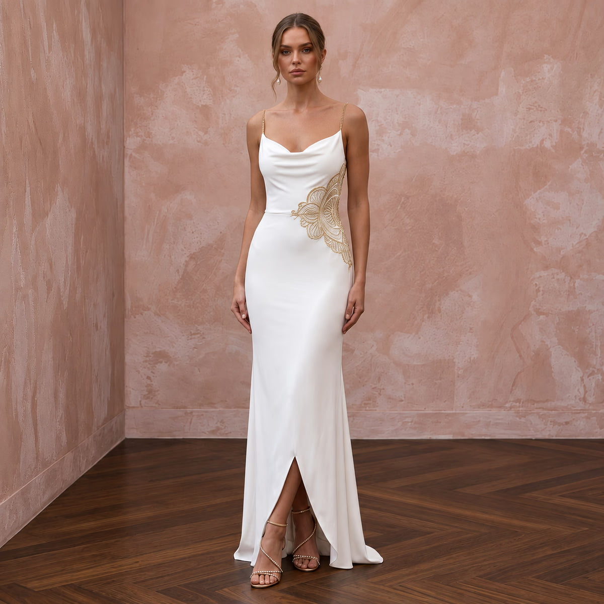 Minimalist ivory matte jersey sheath dress with cowl back and gold embroidered detail, featuring a front slit. Main image