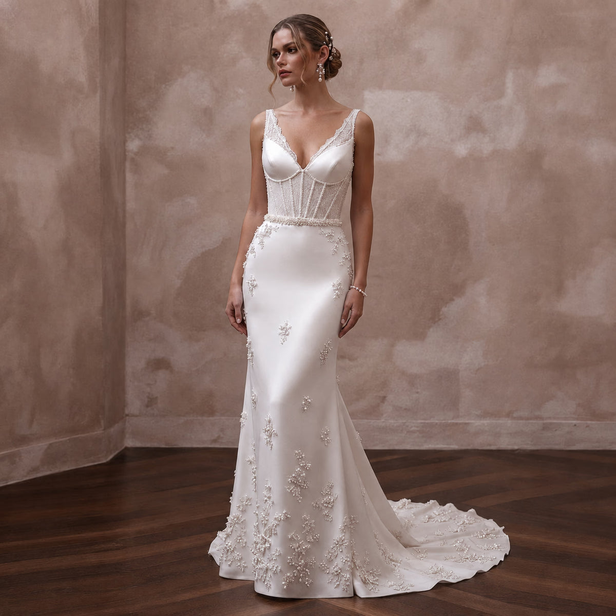 White satin sheath wedding dress with V-neck bodice, floral beading, and long train Main image