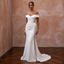White off-the-shoulder mermaid gown with draped neckline and lace panel