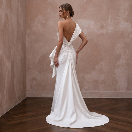 Modern Wedding Dresses with Sculptural Satin Shapes - Apparel & Accessories > Clothing > Wedding & Bridal Party Dresses > Wedding Dresses - Mignonette