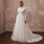 Ivory lace A-line wedding dress with long sleeves, high neck, fitted bodice, tulle skirt