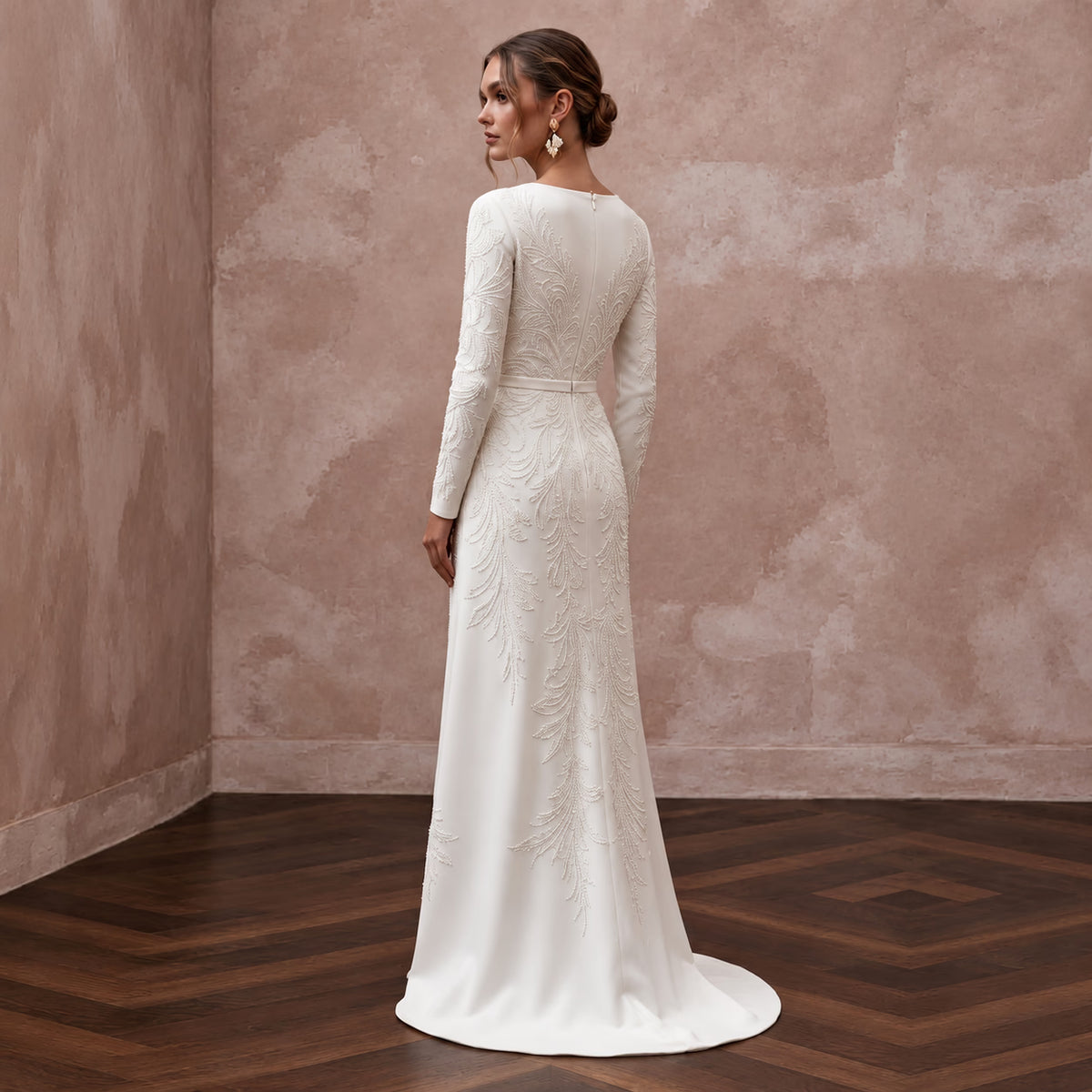 Long sleeve Alabaster Crepe maxi dress with wrap front and intricate embroidery, perfect for elegant occasions.