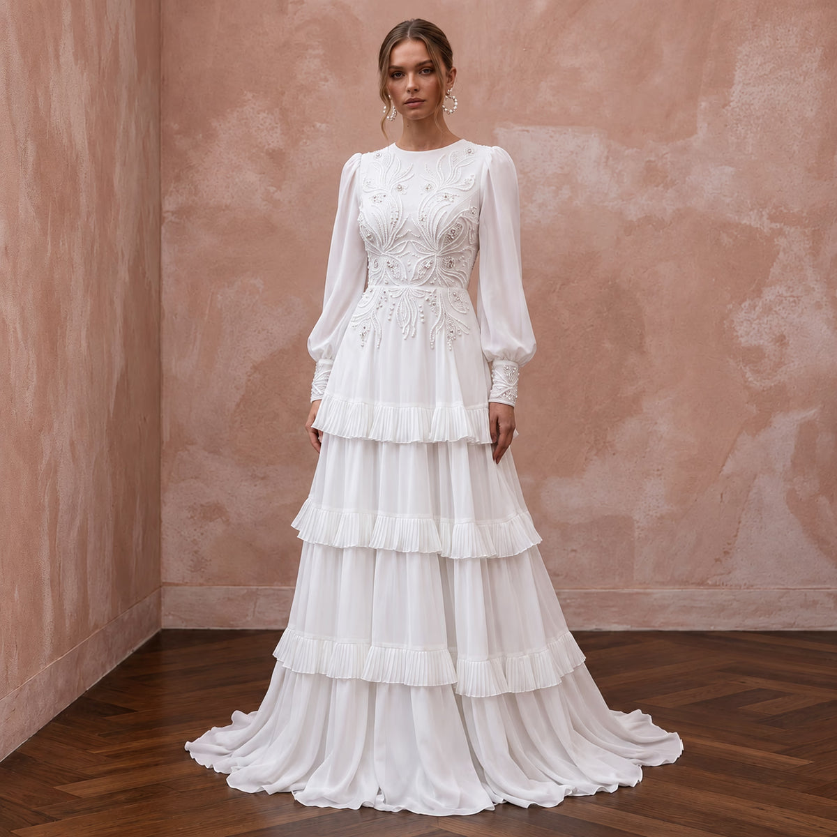 Elegant pure white chiffon gown featuring a tiered skirt and long sleeves, perfect for modest formal occasions.