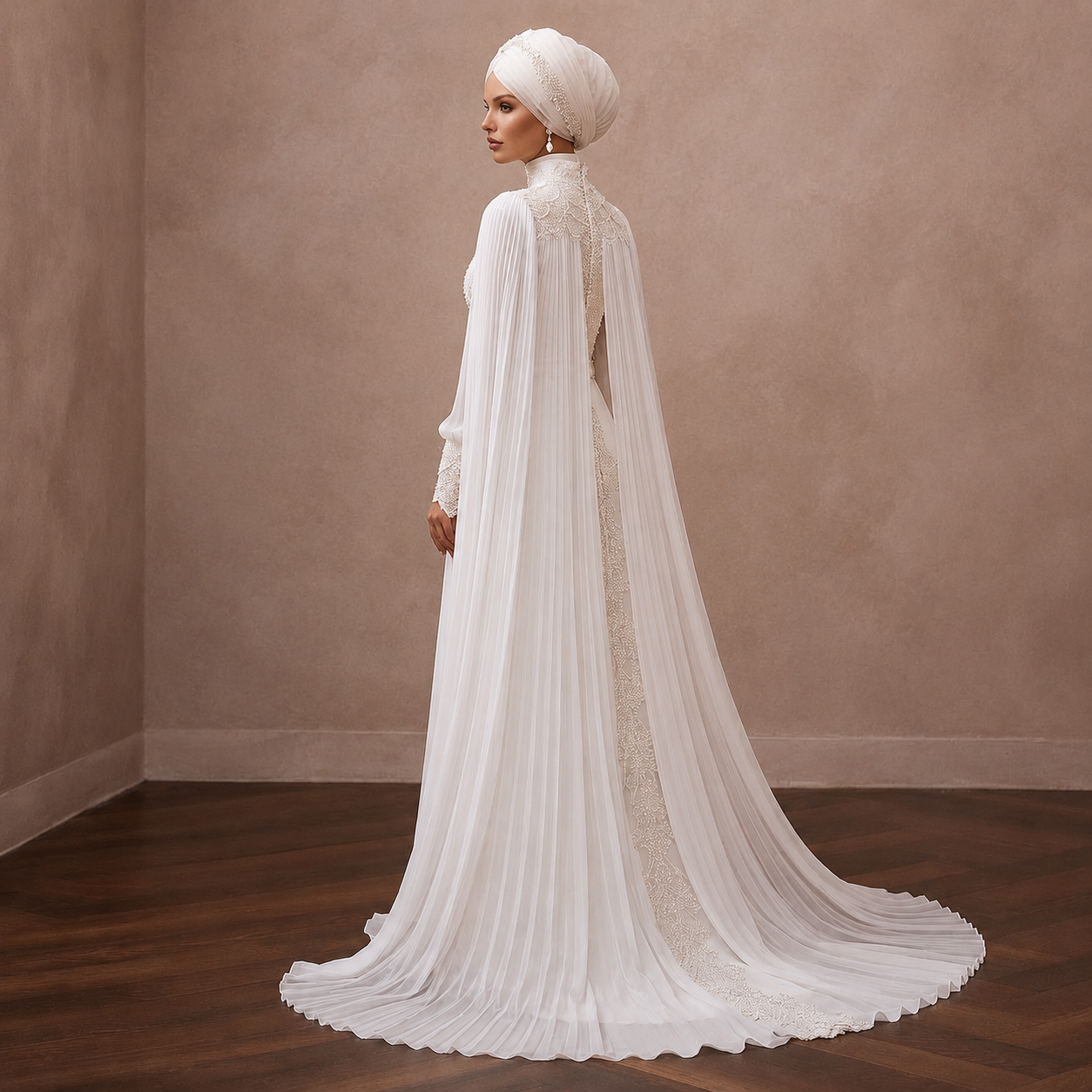 White chiffon cape wedding dress, side view with lace back and draped veil