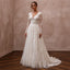 Ivory lace wedding dress with long sleeves, A-line skirt, illusion neckline