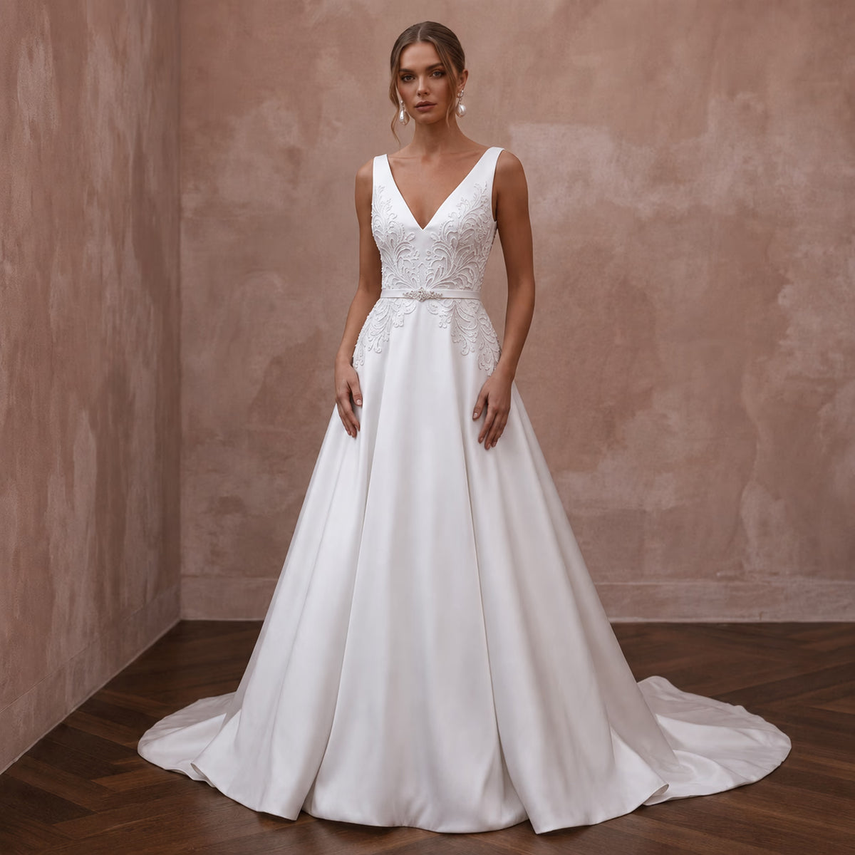 White sleeveless satin V-neck wedding dress with lace bodice and A-line skirt Main image
