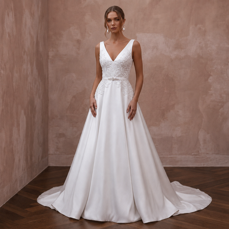 White sleeveless satin V-neck wedding dress with lace bodice and A-line skirt