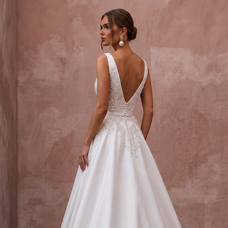 White satin wedding dress backless V-neck with lace details and A-line skirt