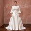 Plus size ivory duchess satin drop waist dress with embroidered bodice and bell sleeves, perfect for grandmillennial style.